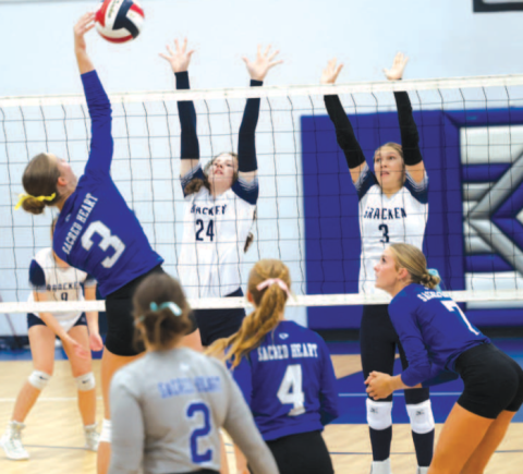 Photo by Chuck Grafe Sophomore Layne Besetzny (3) attacks vs. Bulverde Bracken Christian here Tuesday, Sept. 23.