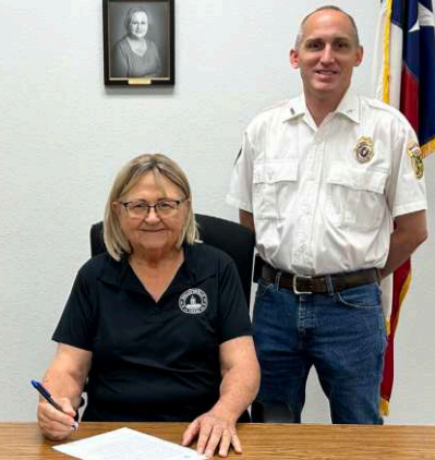 The week of Oct. 5 through 11 is National Fire Prevention Week. From left are Hallettsville Mayor Alice Jo Summers and Hallettsville VFD chief Stephen Grahmann. Photo by Ani Zak
