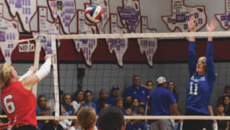 Photo by Mark Lube/Shine Gazette Catherine Lemonds (11) goes up to block St. Paul’s Emery Kennedy