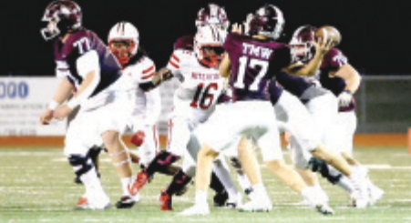 Photo by Chuck Grafe Quarterback Wyatt Kram throws a 52-yard touchdown pass in the fourth period.