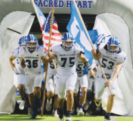 Photo by Sacred Heart Booster Club The Indians take the field Friday night in Bryan.