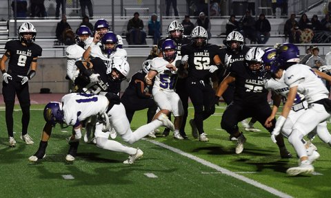 He can deny it if he wants but Junction’s Brock Bierschwale is simply not getting by Comanche defensive back Jake Simper on this play in  Shiner’s 22-6 win over the Eagles in the state quarterfinals. Photo by Mark Lube.