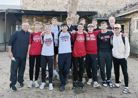 The St. Paul Cardinals boys basketball team get together for a photo after winning the Round-Top Carmine Tournament with a 4-0 record last weekend. Photo courtesy of St. Paul Booster Club.