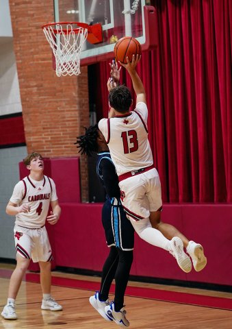 Jack Ehrig makes a jump shot again Bracken. He led the Cardinals with 21 points. Photo courtesy of Photos by Lori Raabe.