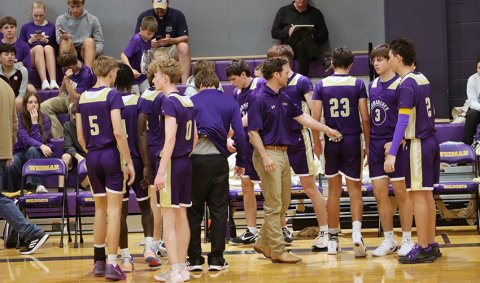 The Shiner Comanches and coaches huddle during a break in the action Friday in Weimar. Photo courtesy of Louann Heinsohn.