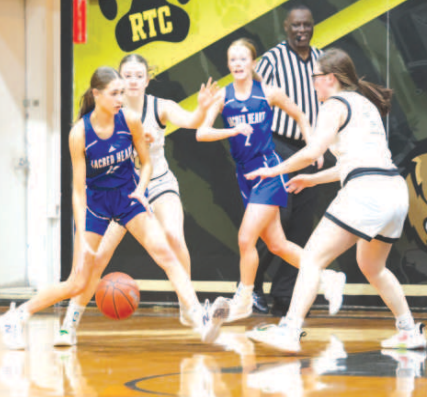 Photo by Chuck Grafe Kinley Migl in the RT-C game Jan. 6.