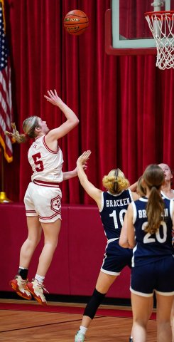 Skylar Mozisek with a second-half shot attempt Thursday against Bracken. She scored 17 points. Photo courtesy of Photos by Lori Raabe.
