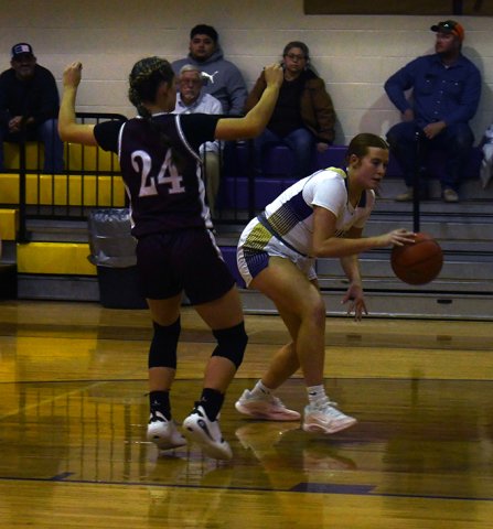 Lexi Boner secures the ball in the first half against Flatonia. Photo by Mark Lube.