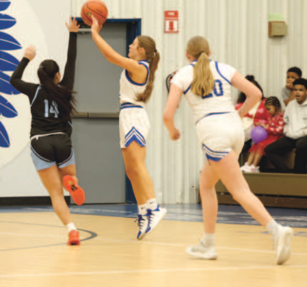 Photo by Chuck Grafe Alli Clark hit a pair of threes in the bi--district victory.