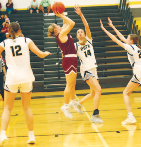 Photo by Chuck Grafe Haven Drozd puts up a shot in the lane. Haven is one of three seniors for the Lady Brahmas.