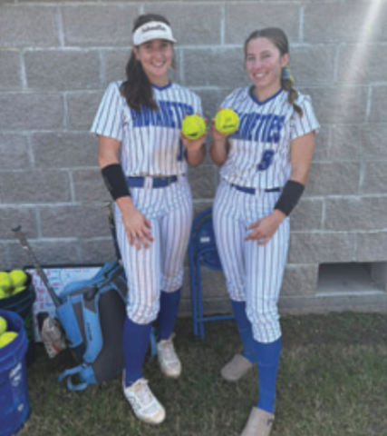 Contributed photo Ella Demel left, hit two home runs and Avery Beach one in the tournament.