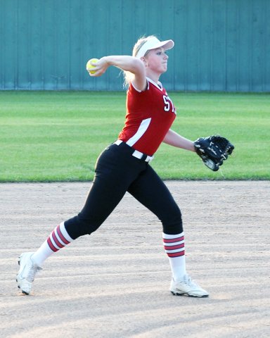 Emery Kennedy makes a throw to first base. She had two putouts and one assist against Boling. Photo by Mark Lube.