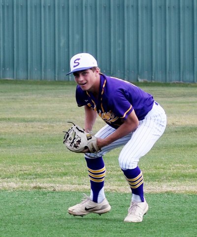 Clayton Fric gets ready to throw after fielding a ground ball against Giddings in the Hallettsville Tournament on Thursday. He had one assist against the Buffs.  Photo by Mark Lube.