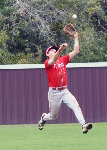 Shortstop Jace Matias catches a fly ball during St. Paul’s Flatonia Tournament game against Schulenburg on Friday morning. He made one putout and four assists. Photo by Mark Lube.