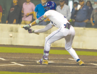 Photo by Chuck Grafe Trent Ferry puts down a bunt during the win over St. Paul.