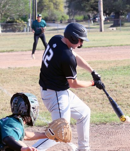 Kenton Kirkland makes contact with the ball. He got three hits with one RBI and scored four runs. Photo by Mark Lube.