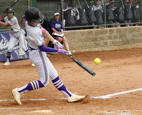 Addy Siegel hits a two-run double in the first inning against Louise on Thursday. She finished with two hits, two runs and three RBI to go along the with the double. Photo by Mark Lube.
