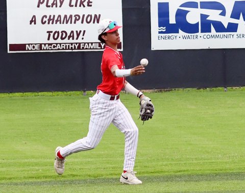 Second baseman Andy Nunez throws a ball towards first base. Nunez had one assist in the field against Bellville Faith Academy. Photo by Mark Lube.