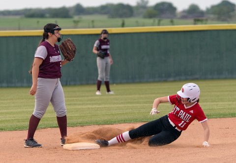 Clara Kinney slides into second base during the home game against San Antonio Lutheran last Friday. Photo courtesy of Photos by Lori Raabe.