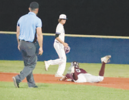 Photos by Chuck Grafe Above, Peyton Willis steals second. Right, Dylan Orsak pitched the final two innings vs. Rice.