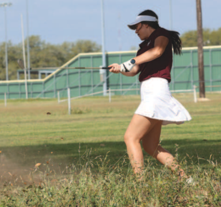 Photo by Chuck Grafe Aubrey Freytag hits out of the rough on No. 9