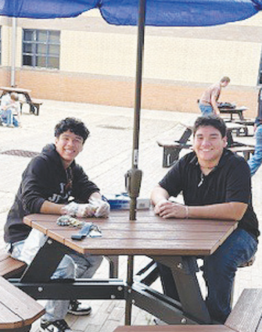 Pictured are students helping with the Yoakum High School's Beautification Project. The project is currently under phase four which includes sprucing up the dead space in the interior grounds of Yoakum High School. Contributed photos.