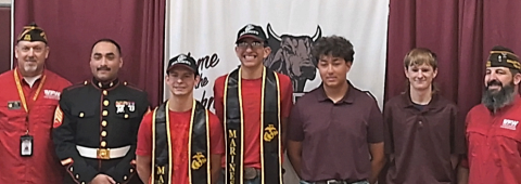 Four Hallettsville High School seniors recently enlisted to serve in the military after graduation. Jake Woytek and Peyton Prihoda enlisted in the USMC, while Lucas Hill and Austin Kainer signed with the US Army. From left to right are Steven Drozd, USMC veteran, USMC Marine Corps recruiter Sgt. Axel Gonzalez- Sanchez, Woytek, Prihoda, Hill, Kainer and VFW Post 6382 commander Daniel Smith. Photo courtesy of The Lariat