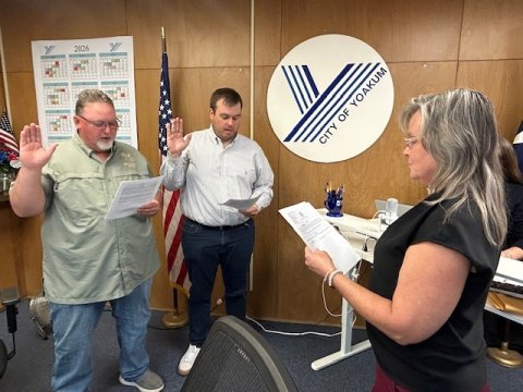 The Yoakum City Council administered the Oath of Office to council members Michael Brandt and Mitchell Franz. Both members are renewing their terms. Pictured at far right is City Clerk Theresa Bowe.