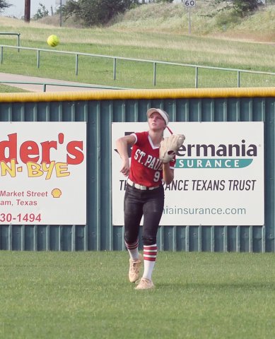 Presley Rother throws the ball after fielding a hit.  Photo by Mark Lube.