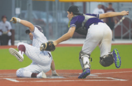 Photo by Chuck Grafe Wyatt Kram scores on the front end of a double steal.