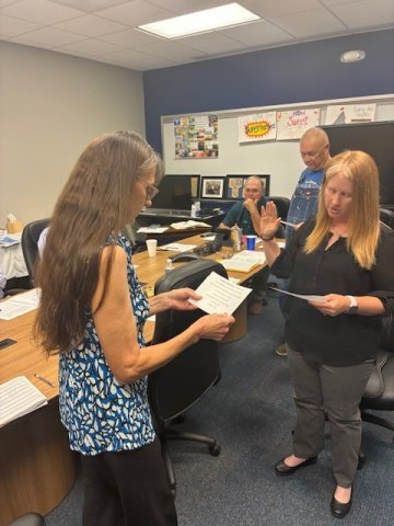 The Yoakum ISD Board administered the Oath of Office to board member Amanda Fling for a three-year term. At left is Paula Janota.