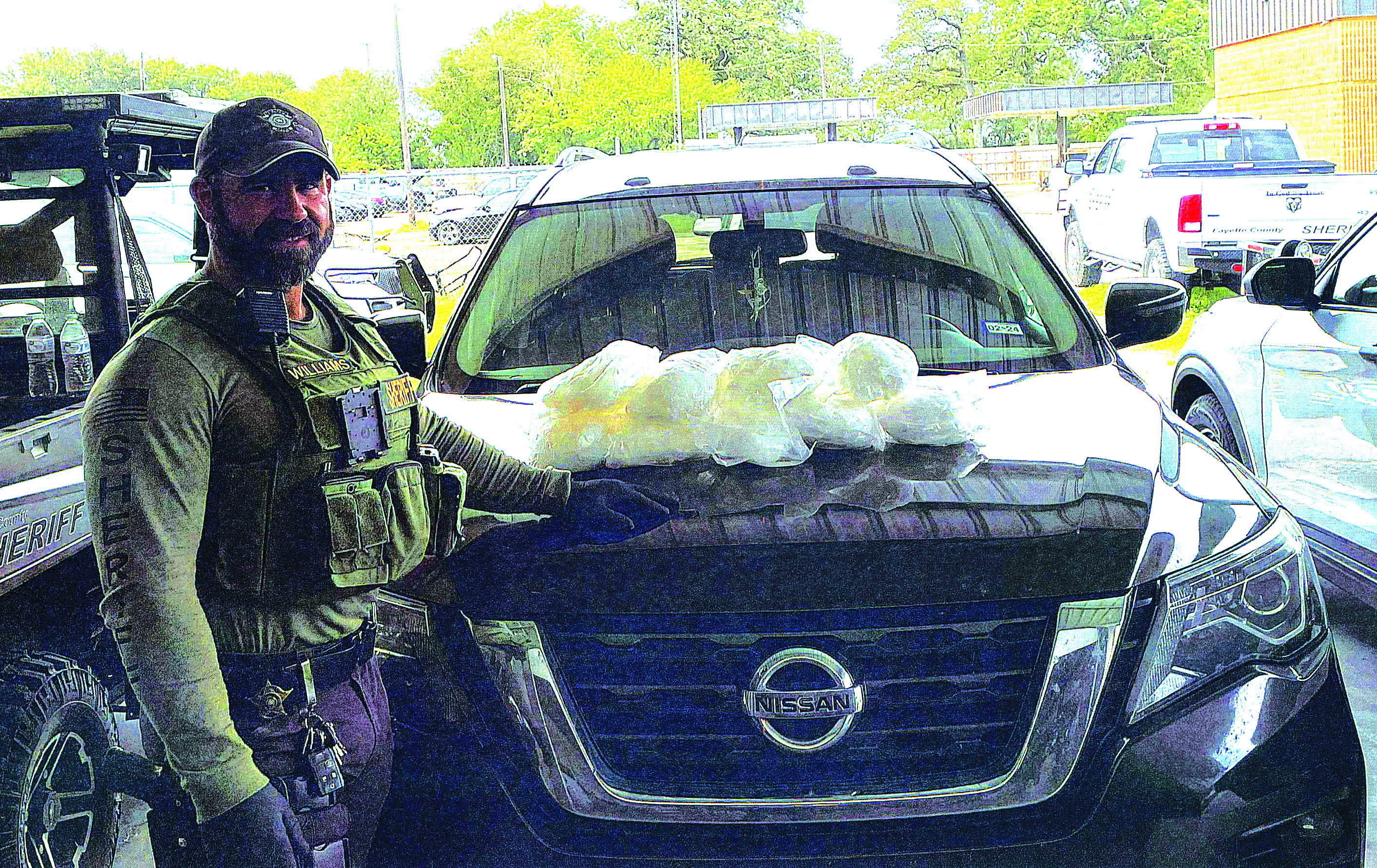 Deputy Williams with seized drugs