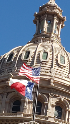 the flags over the Capitol building in Austin, the largest of all our nation's capitols (including the one in Washington, D.C.
