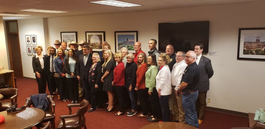 Most of Lavaca County's 40 gather for photo before splitting up once more to visit with various lawmakers.