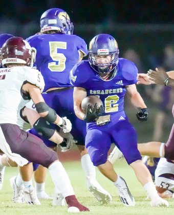Shiner’s Rakin Wallace looks for an opening in game action against Hallettsville Friday night in Shiner. Photo by Howard Esse.