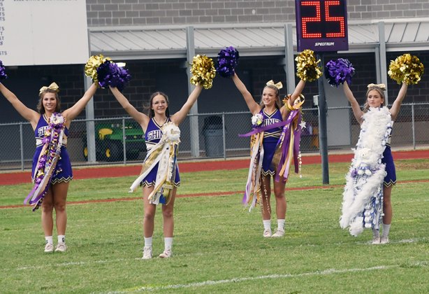 Members of the Shiner varsity cheer squad from left Chesney Machacek, Grace Migl, Callie Sevcik and Hayleigh Burns perform before the EB-Shiner football game. Photo by Mark Lube.
