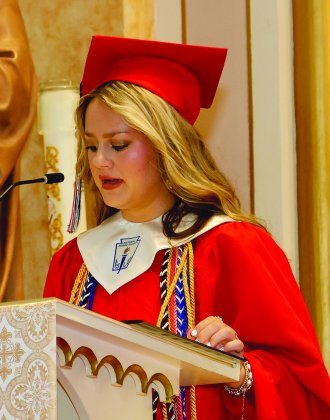 The valedictory was given by Karis Barta. 