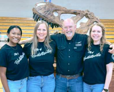 THE FRIENCH SIMPSON MEMORIAL LIBRARY STAFF at the dinosaur exhibit that children’s librarian and activities director Shay Davenport hosted last weekend in May. Pictured Shay Davenport, Brandi Thigpen, George Blasing (Dinosaur George) 