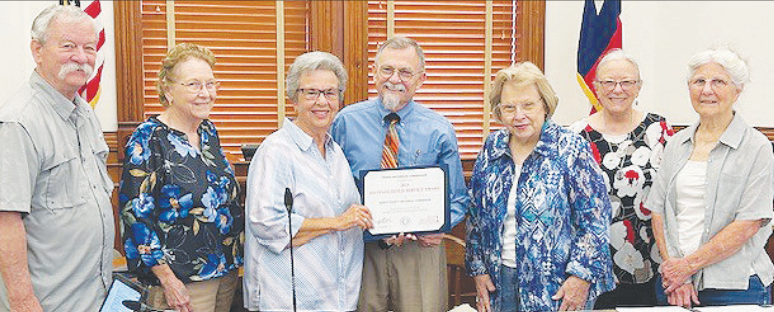 Pictured are members of the DeWitt County Historical Commission with the DeWitt County Commissioner’s Court. The DeWitt County Historical Commission was presented with a Distinguished Service Award.