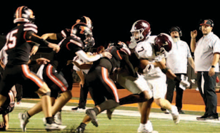 Photo by Chuck Grafe Tezmond Gutierrez (7) gains yardage after a pass reception.