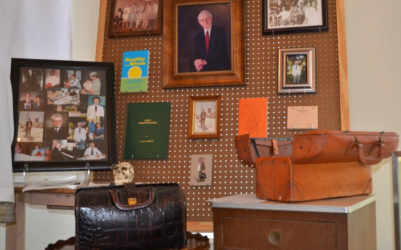 The exhibit features a section dedicated to Dr. A Earl Mgebroff.