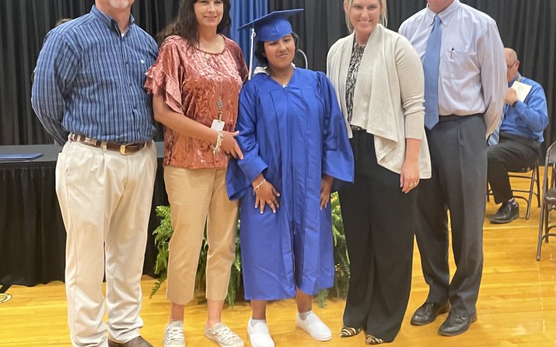 Stephanie Gonzales of Yoakum ISD poses while being celebrated as a graduate in the Yoakum High School Blue Gym on May 20.