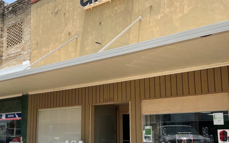 The project scope includes improvements to the office space adjacent to the Cricket Wireless storefront downtown at 215 West Grand Ave.