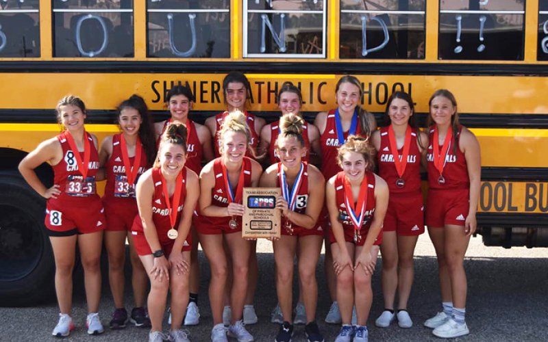 The second-place Lady Cardinals gather for a team photo before heading home. Photo courtesy of Jake Wachsmuth.