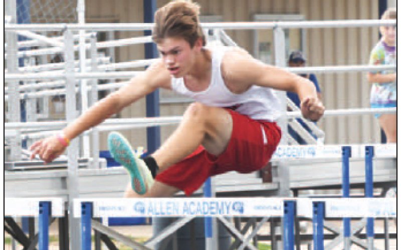 Trent Brown placed first in the 110 hurdles. Photo by Mark Lube.