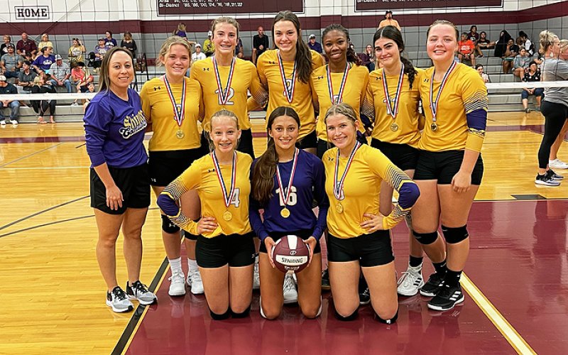 The Shiner Lady Comanches JV Gold volleyball team won four matches in the Flatonia Tournament last week to take first place. Photo courtesy of Anastacia Rehak.