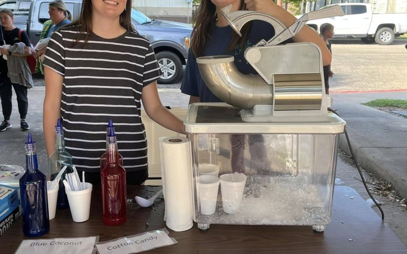 Snow Cones being served by Emily and Samantha.