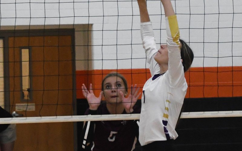 Meghan Blaschke makes a set in the East Bernard match on Friday. Photo by Mark Lube,