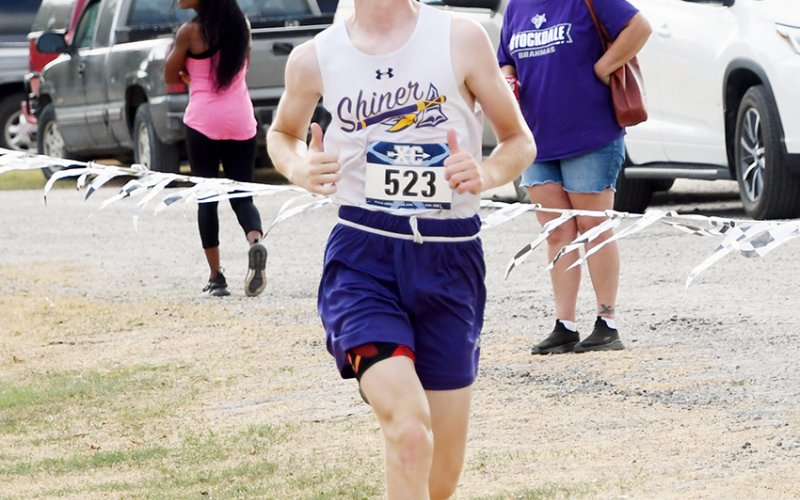 Landen Christensen down the stretch in the 1A-2A Boys varsity race in Moulton Saturday. His time was just over 20 minutes and a No. 19 place. Photo by Mark Lube.