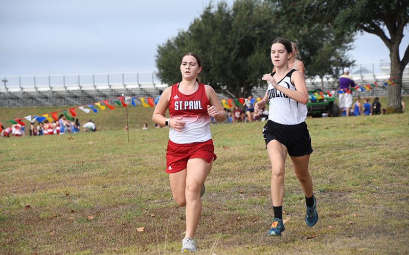 Katie Richter (right) was No. 48 in 15:44.02. Photo by Mark Lube.